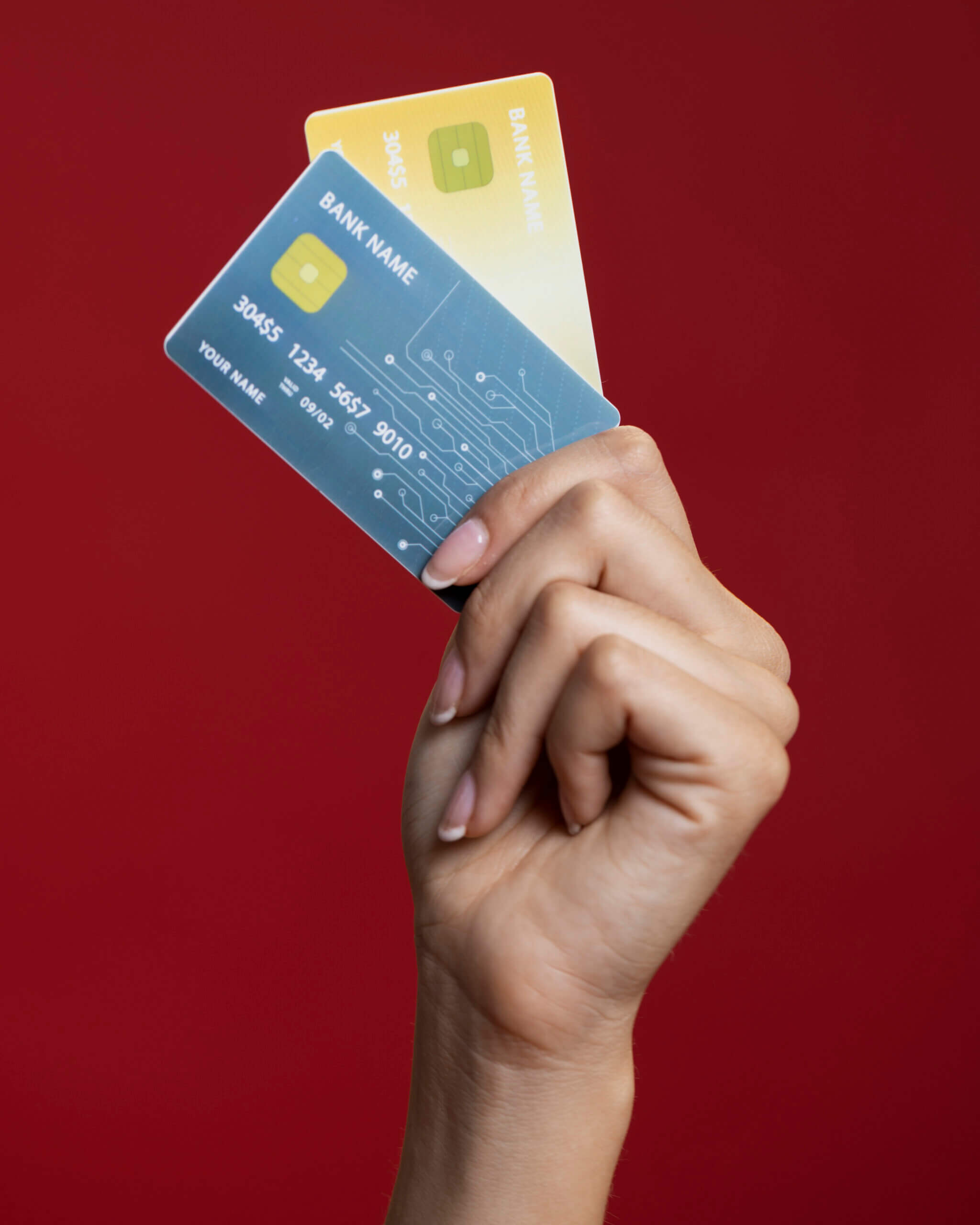 woman-holding-her-credit-cards-close-up woman-holding-her-credit-cards-close-up-scaled.jpg
